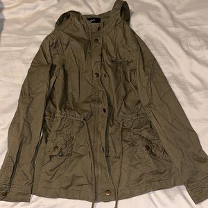 Green utility jacket.